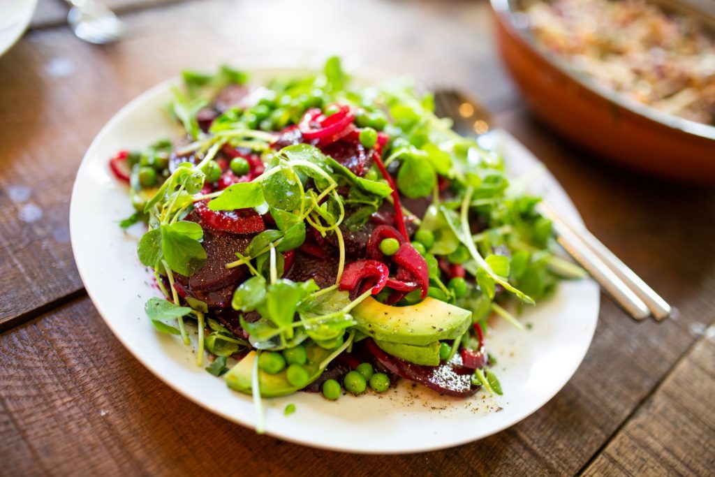 Salad bowl: lettuce, avocado, green beans, and and beetroot